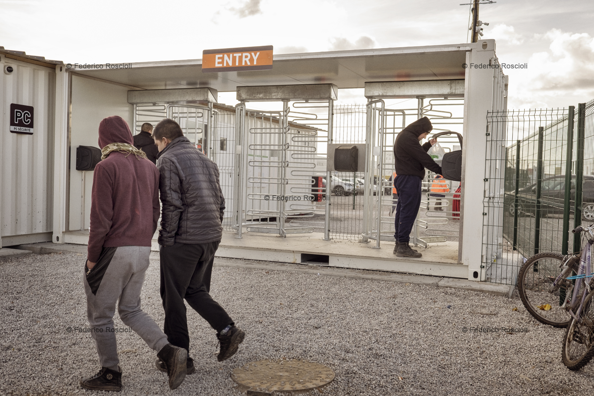 Calais, France. February 28, 2016. Entrance of the container area inside the camp. This area was built in January 2016, it is accessible only by fingerprints and once in you lose the chance of reaching the UK.