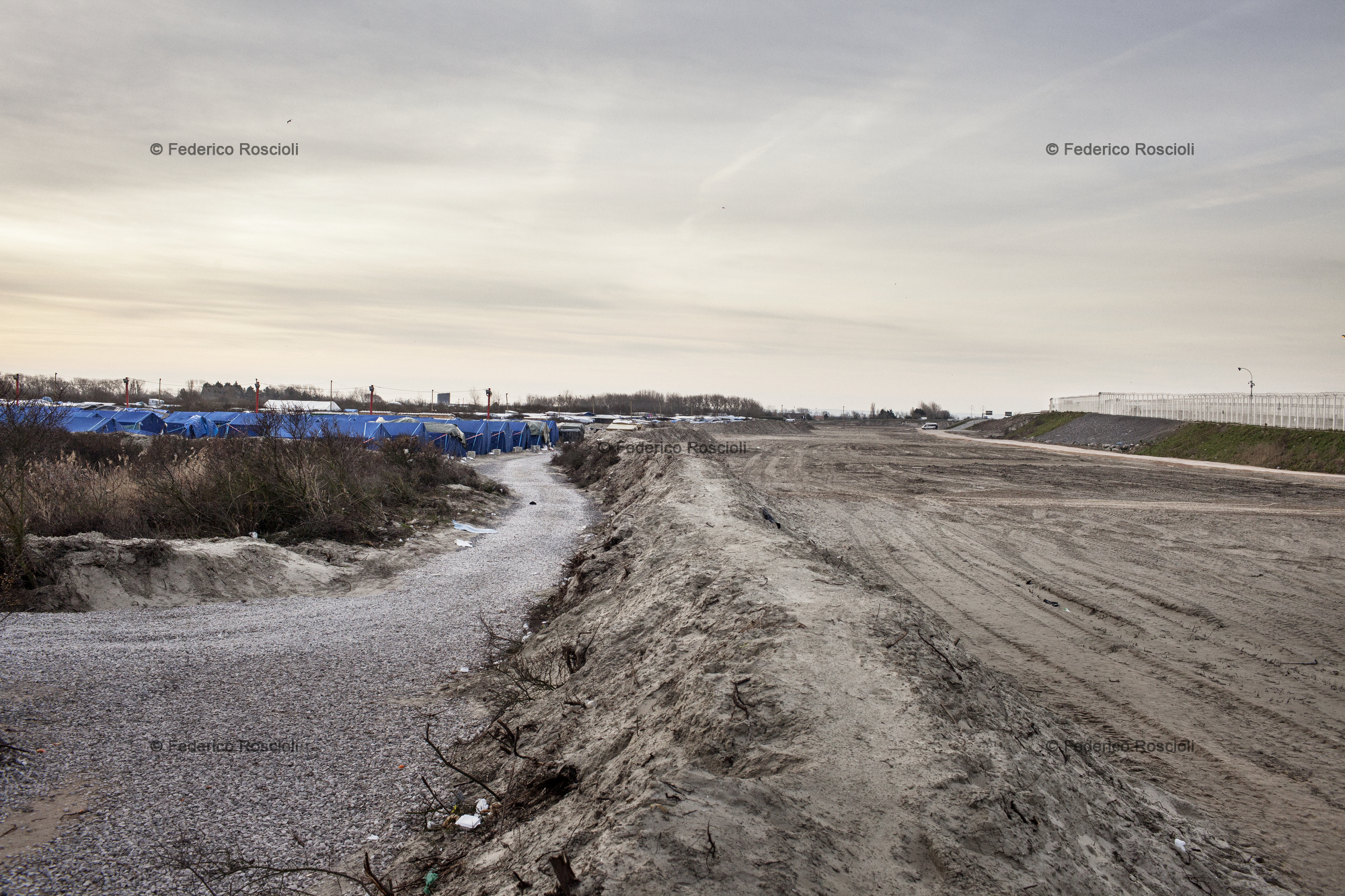 Calais, France. February 28, 2016. View from the wall between the cleared area and the camp. In the last week a part of the camp was destroyed by the French government and the area completely cleared.