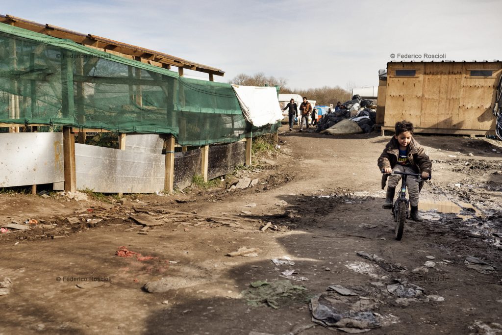 Calais, France. February 28, 2016. More than 300 children are hosted inside the camp and the majority of them are unaccompanied. The Calais Jungle Camp for migrants, in Calais, France, dates January 2015, it is now the biggest refugee camp in Europe, hosting around 3700 migrants from all over the world. The people hosted in the camp are willing to reach the UK due to the lack of job opportunities in the rest of Europe.