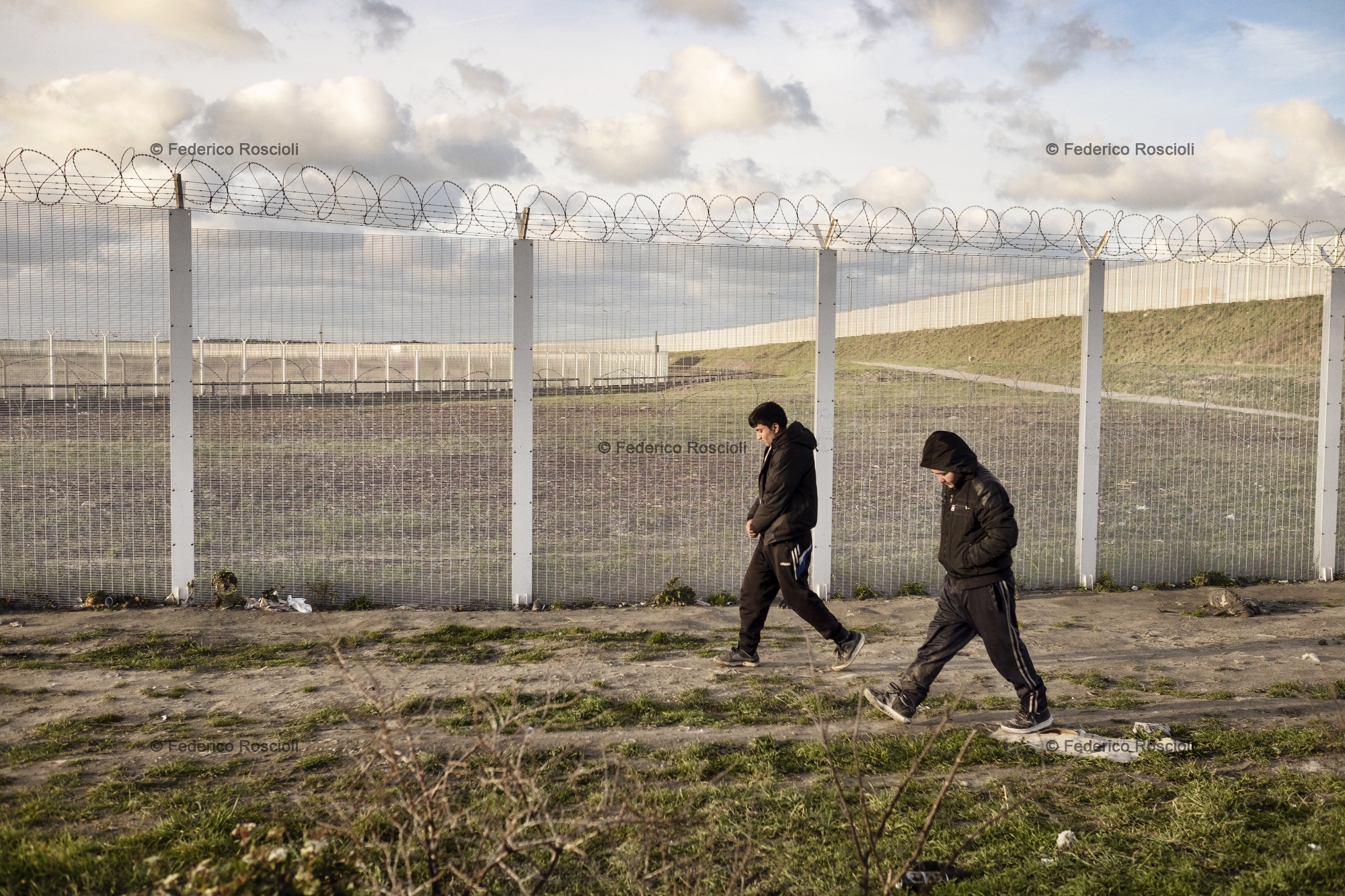 Calais, France. February 28, 2016. During evenings and nights migrants walk from the camp to the train station or the truck parking in order to 'try it', meaning try to reach the UK.