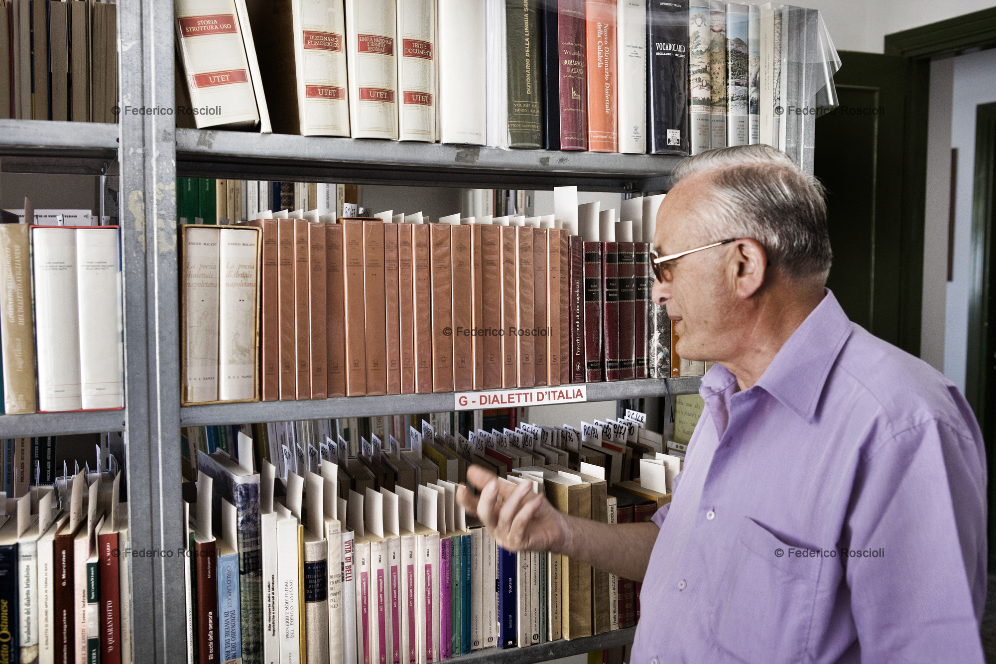 Calitri, Avellino, Italy. August 28, 2013. Raffaele Salvante in his library.