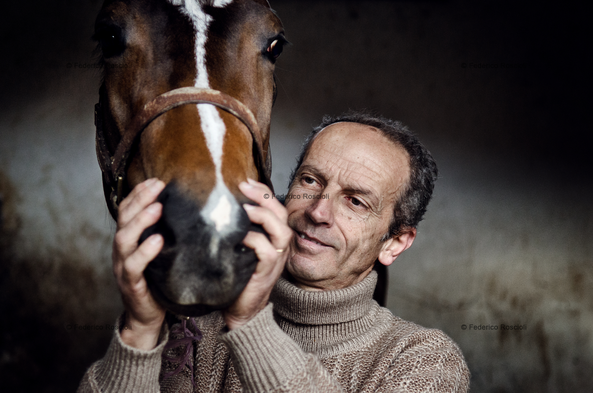 Rome, Italy. March 10, 2013. Fabio Carnevali, president of Assogaloppo (Association of horse racing entrepreneurs), after 20 years of career as horse trainer, becomes unemployed. The owner of his last two horses decided to send them to the countryside and let them live in the field.