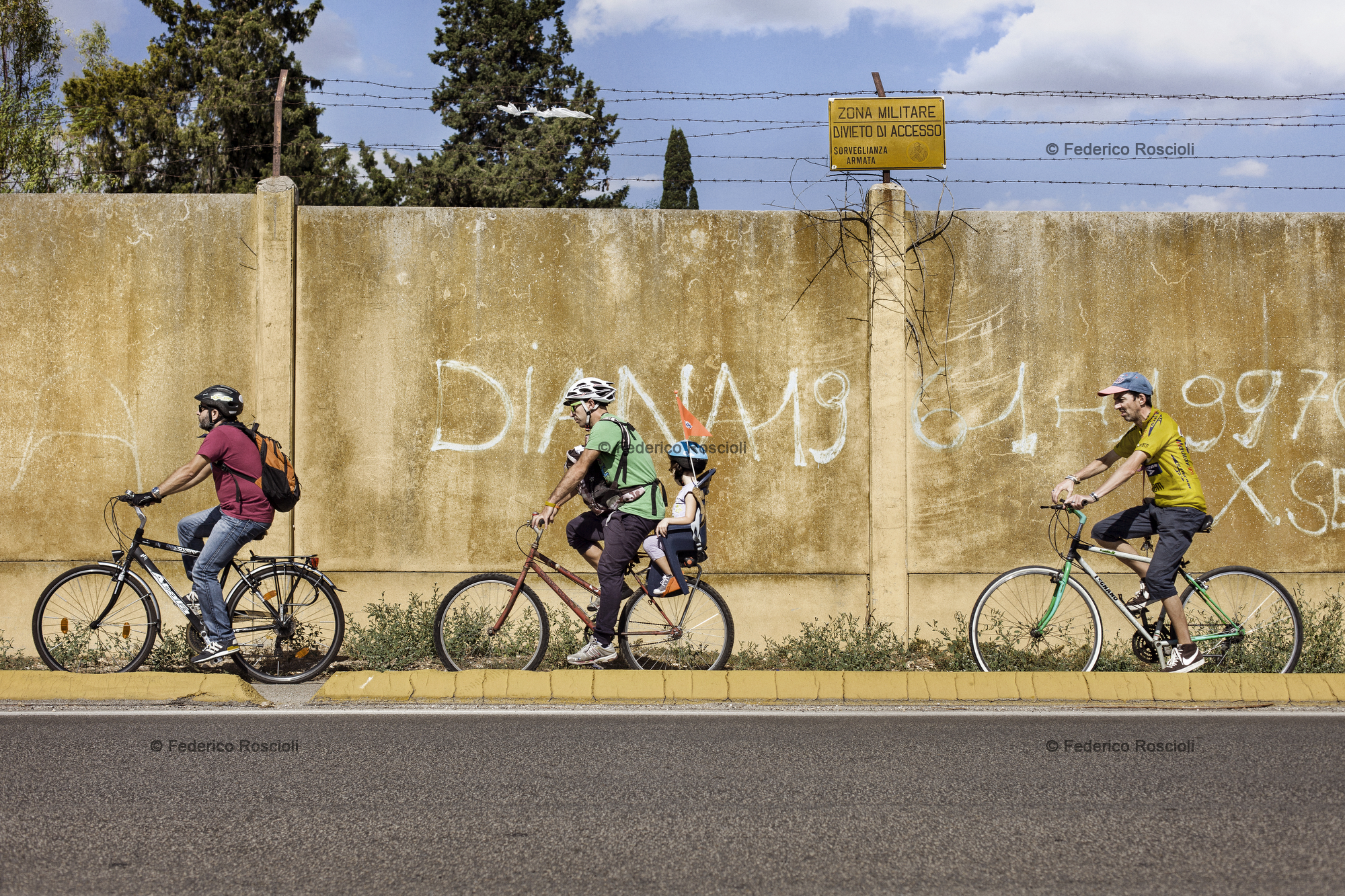 Taranto, Italy, September 22, 2013. A tour along the bicycle path of Taranto to revel the abandon status. The bicycle path runs almost completely along the Naval Base wall. The European Sustainable Mobility Week was organized for the first time in Taranto by the associations The Howlers and Cirano, and the support of the Municipality of Taranto.